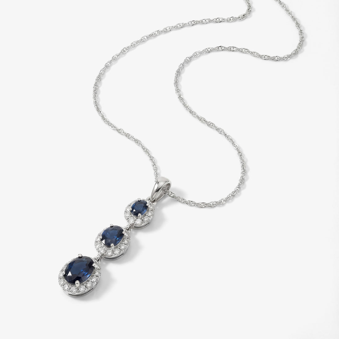 Graduated Natural Blue Sapphire and Diamond Drop Pendant in 18K White Gold - JewelryAndStore