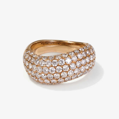 Gold ring with multiple rows of diamonds on a white background from JewelryandStore
