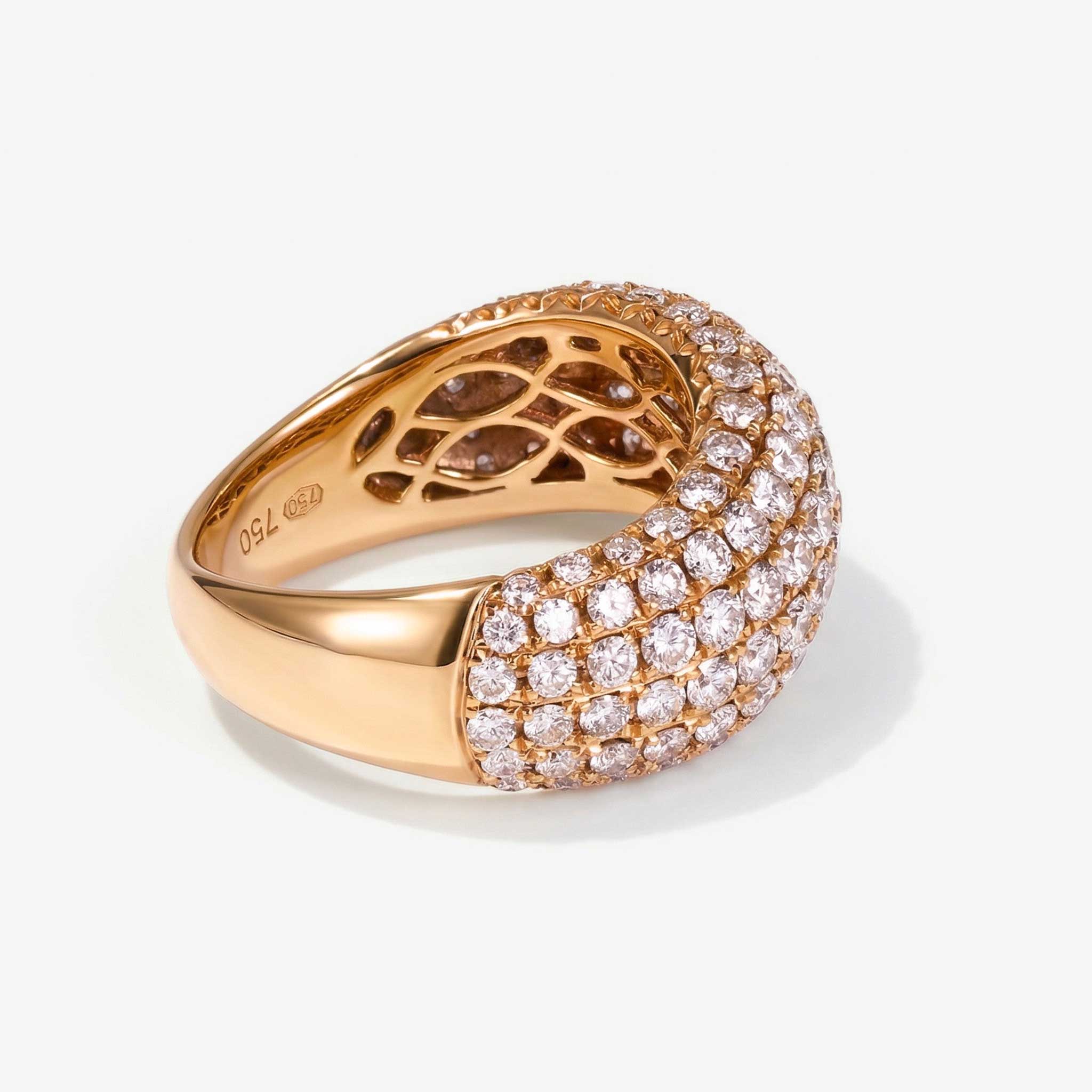 Rose gold ring with diamond accents on a white background from JewelryandStore