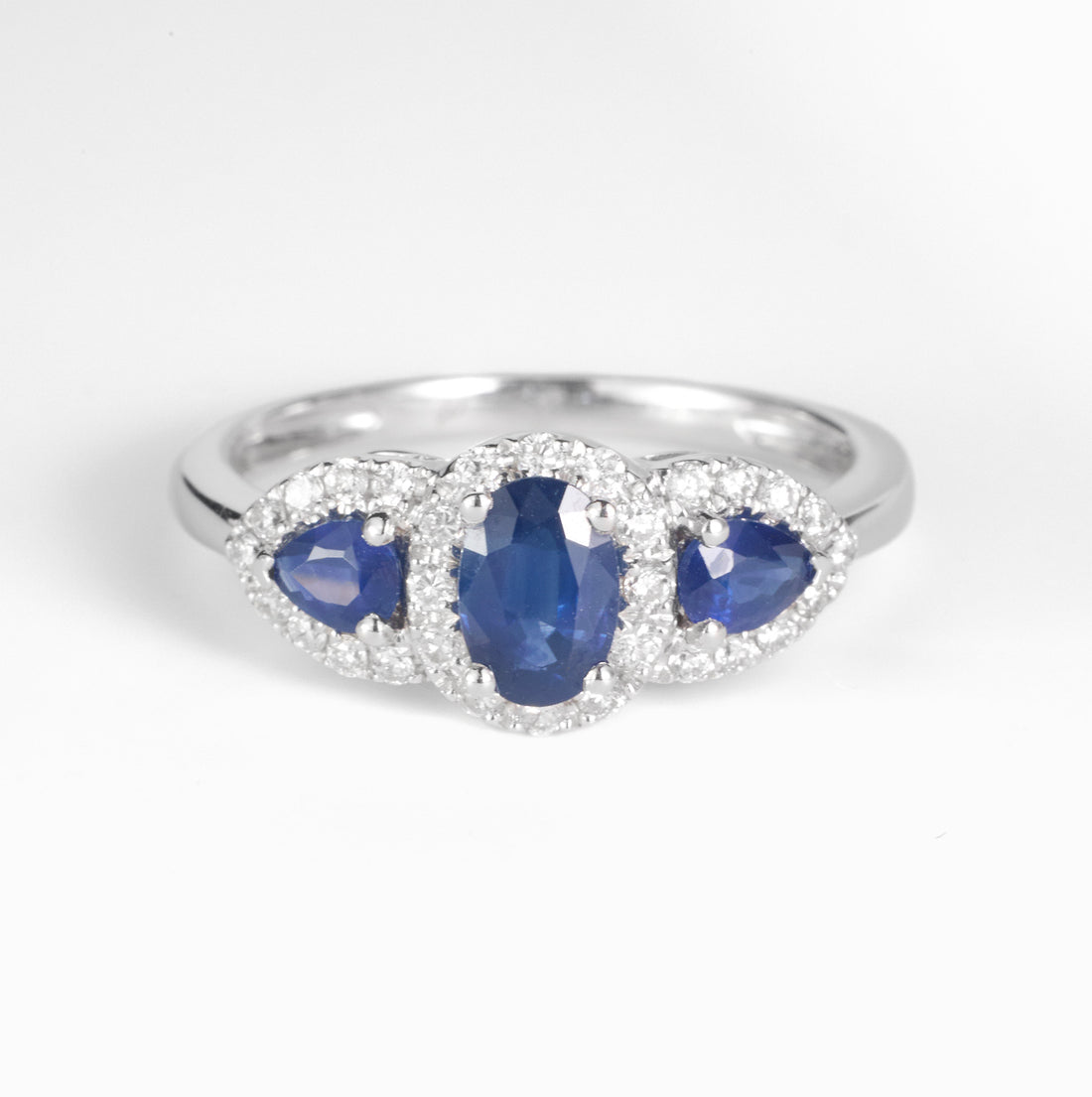 1.03ct.tw. Blue Sapphire and Diamond Three - Stone Ring in 18K Gold - JewelryAndStore