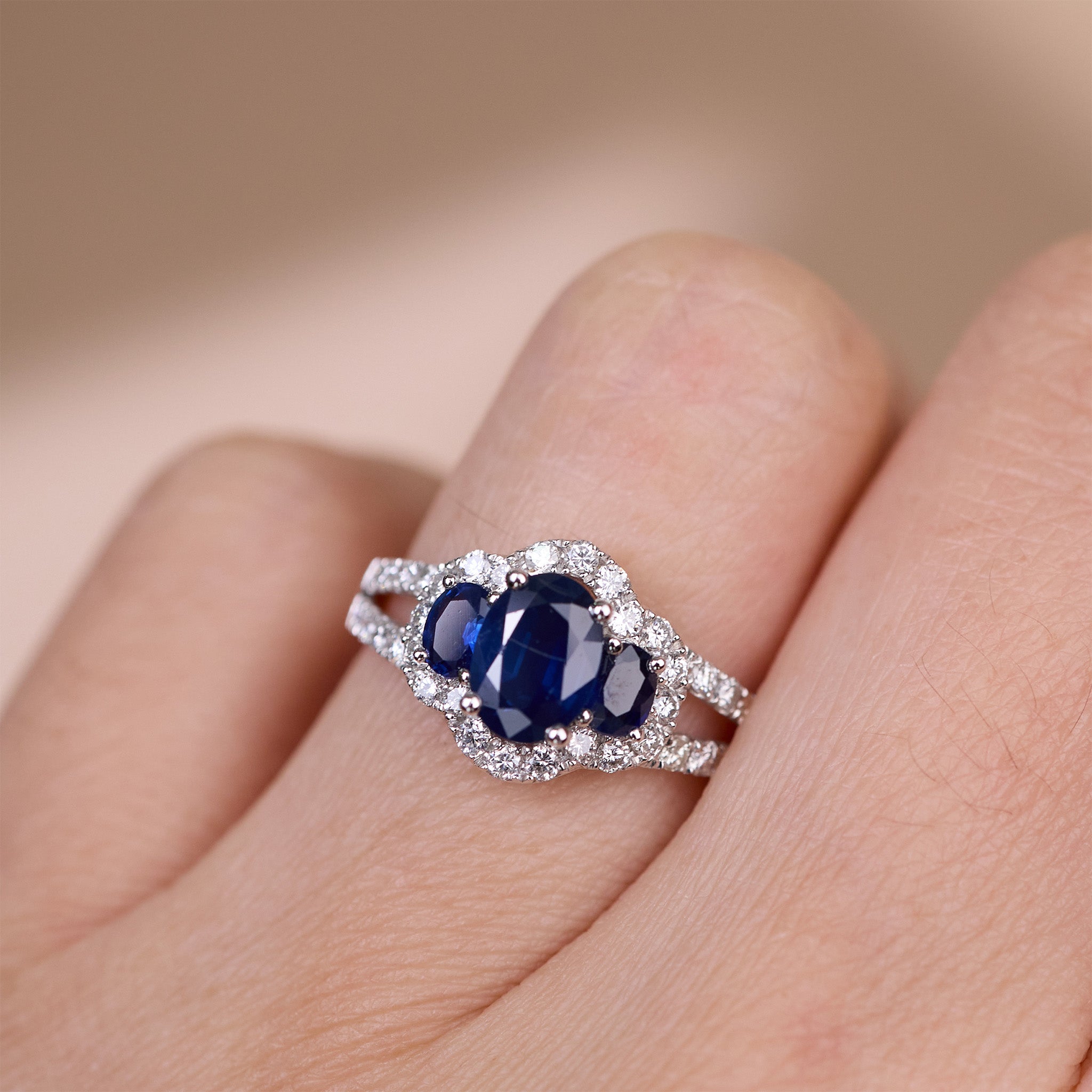 1.03ct.tw. Blue Sapphire and Diamond Three - Stone Ring in 18K Gold - JewelryAndStore