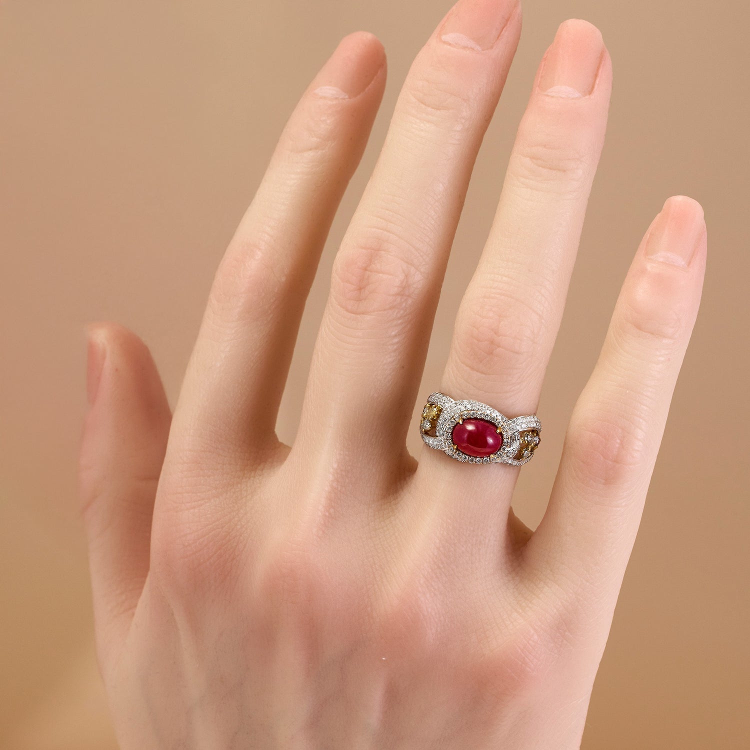18K White Gold Ring with an Natural Oval Ruby and Fancy Diamonds
