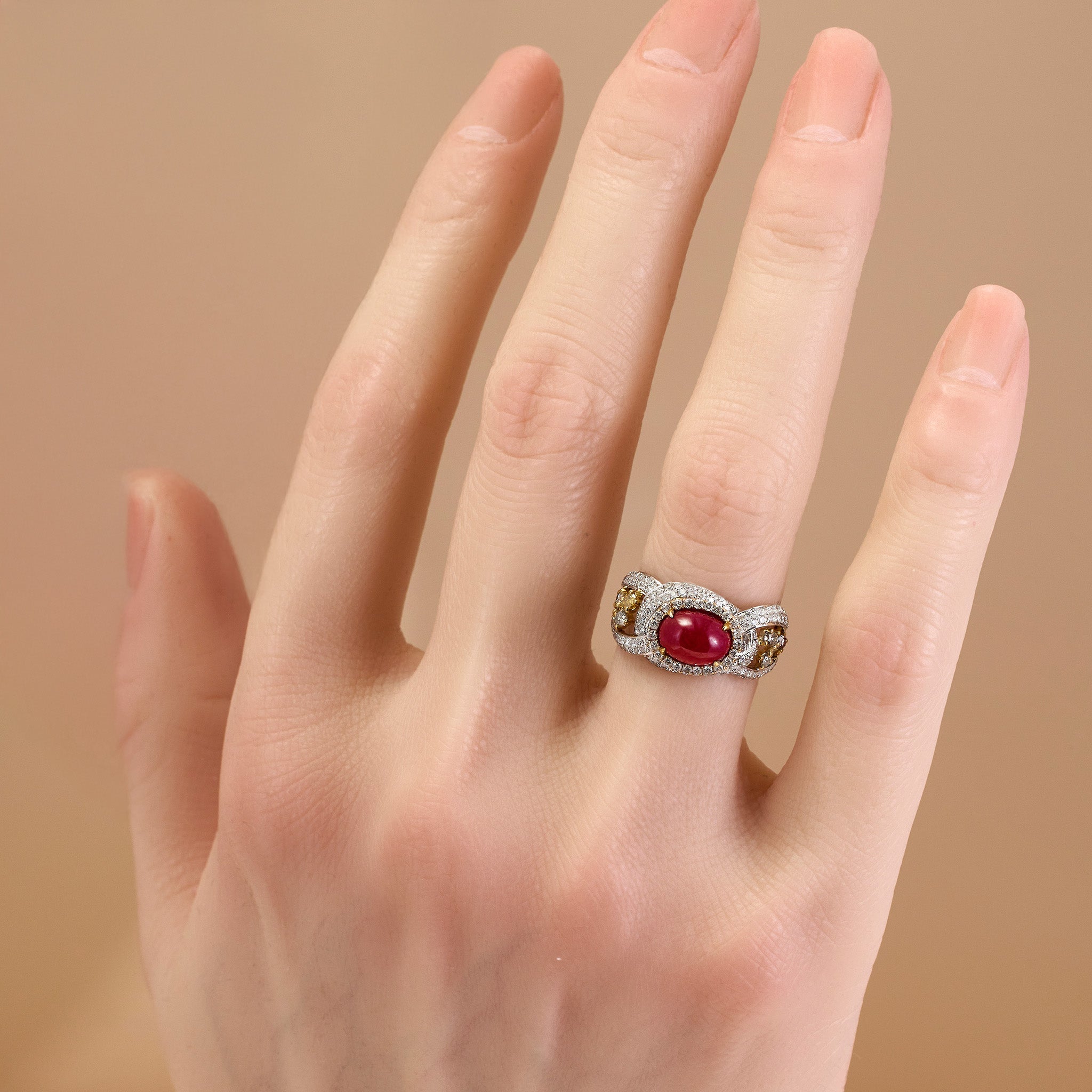 18K White Gold Ring with an Natural Oval Ruby and Fancy Diamonds