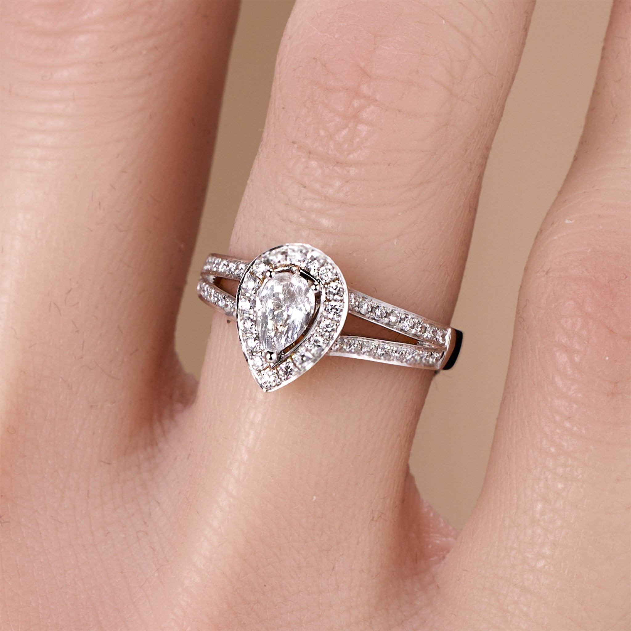 0.69ct.tw. Pear - Shaped Diamond Halo Engagement Ring in 18K White Gold - JewelryAndStore