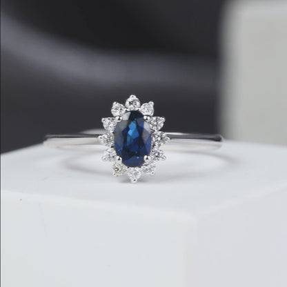 0.54 ct.tw. Natural Blue Sapphire Solitaire Ring with Diamonds in 18K Gold from JewelryandStore