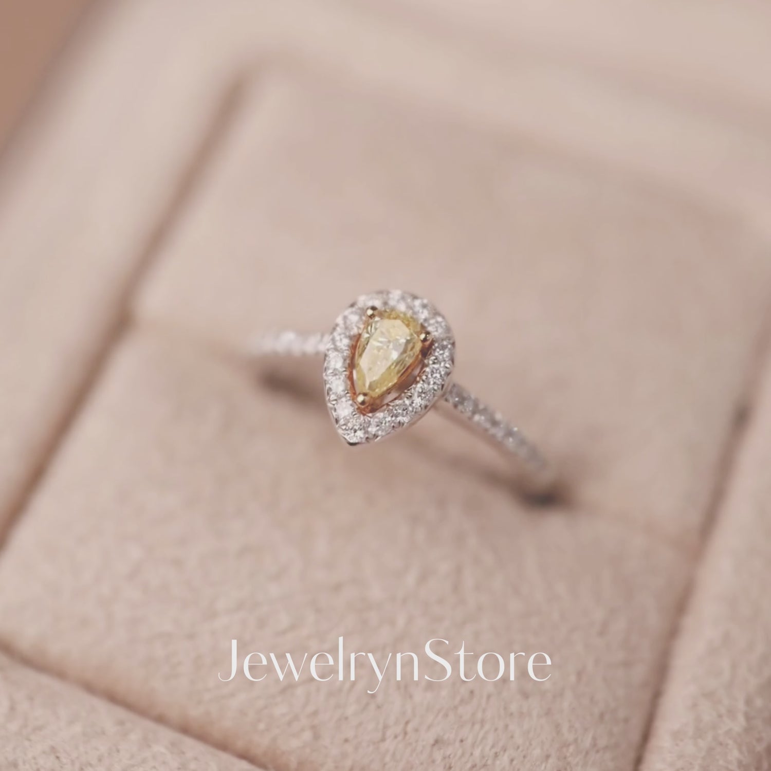 Pear-shpaed Yellow Diamond Engagement Ring