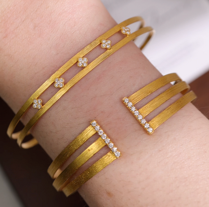 18K Gold Open Cuff Bangle with Diamond Clover Motifs from JewelryandStore